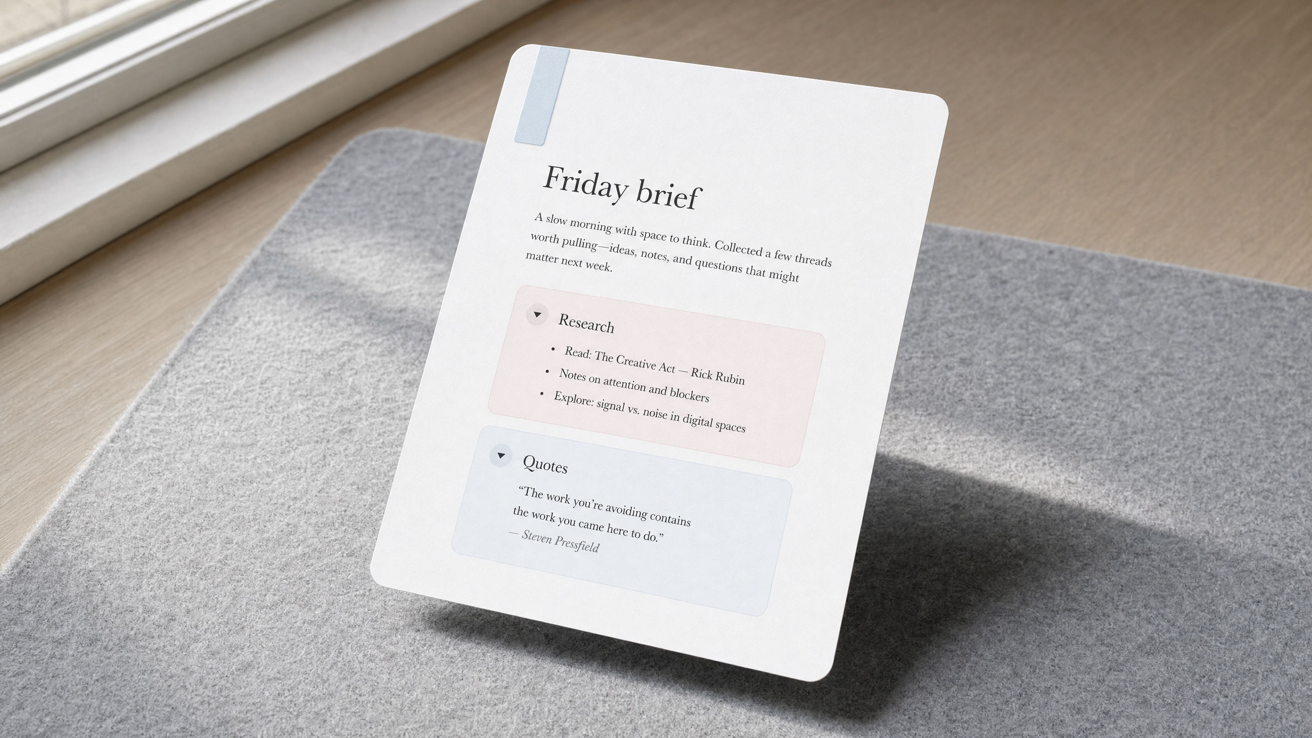 A floating Friday brief sheet on a dove-gray blotter, with nested Research and Quotes cards on the page.